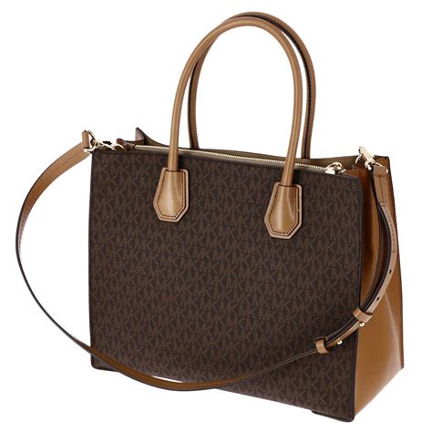 michael kors braune handtasche mit bommel